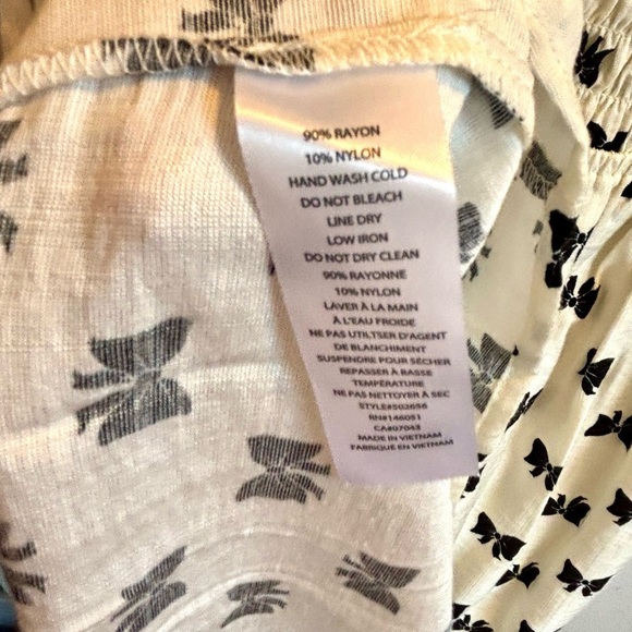 Cream Ruffled Off-Shoulder Dress with Black Bow Design - Picture 5 of 7